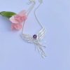 peace angel necklace filigree with a deep purple amethyst gemstone for peace and calm intentions