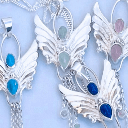 Som angel necklaces in various gemstones